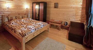 Фото номера Семейный номер с балконом Гостевой дом Wooden cottage г. Судак 9