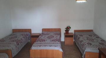 Фото номера Четырехместный номер Гостиница Guest House V gostyah u Ally г. Судак 11