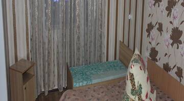 Фото номера Стандартный четырехместный номер Гостиница Guest House Leyla г. Судак 8