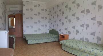Фото номера Стандартный четырехместный номер Гостиница Kanarya Guest House г. Судак 4