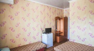 Фото номера Стандартный трехместный номер Гостиница Kanarya Guest House г. Судак 10