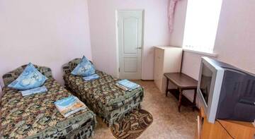 Фото номера Кровать в общем четырехместном номере для мужчин и женщин Гостиница Sudak International Hostel г. Судак 2
