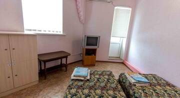 Фото номера Кровать в общем четырехместном номере для мужчин и женщин Гостиница Sudak International Hostel г. Судак 5