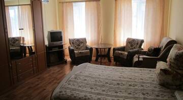 Фото номера Cемейный номер с отдельной ванной комнатой Гостевой дом Cottage na Ayvazovskogo 27 г. Судак 6