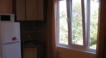 Фото номера Четырехместный номер с террасой Гостиница Guest house Palm г. Судак 16