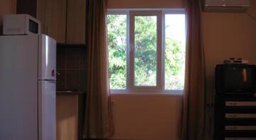 Фото номера Четырехместный номер с террасой Гостиница Guest house Palm г. Судак 8