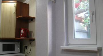 Фото номера Двухместный номер с 2 отдельными кроватями и ванной комнатой Гостиница Guest house Palm г. Судак 9