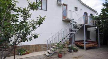 Фото номера Люкс  с 3 спальнями Гостиница Guest House Merzhan г. Судак 10