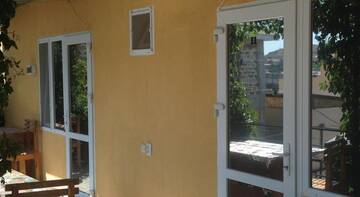 Фото номера Бюджетный трехместный номер Гостиница Guest House Tair г. Судак 10