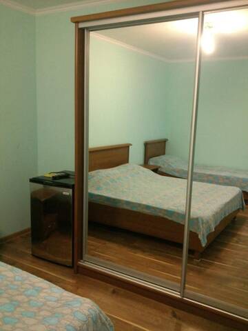 Фото номера Трехместный номер с собственной ванной комнатой Гостиница Nayle Guest House г. Судак 3