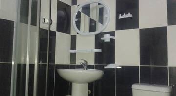 Фото номера Небольшой двухместный номер с 1 кроватью Гостиница Guest House na Kommunalnoy г. Судак 5