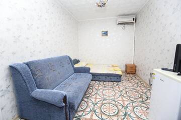 Фото номера Стандартный семейный номер Гостиница Raatlan Guest House г. Судак 4