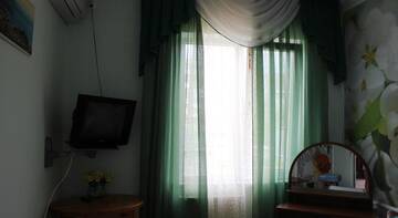 Фото номера Четырехместный номер Гостиница Камелия г. Судак 30