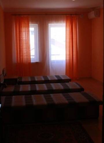 Фото номера Семейный номер с балконом Гостиница Guest House Nonna г. Судак 9