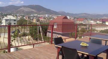 Фото номера Семейный номер с балконом Гостиница Guest House Nonna г. Судак 10