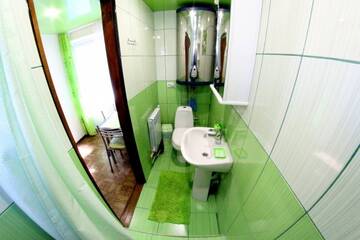Фото номера Двухместный номер с кухней Гостевой дом Zeleniy Dvorik г. Судак 6