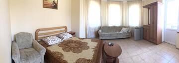 Фото номера Четырехместный номер  Гостиница Guest House Komfort г. Судак 7