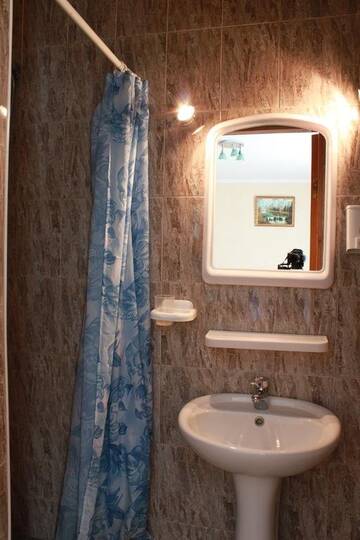 Фото номера Трехместный номер Гостиница Guest house Faro г. Судак 5