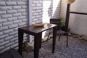 Фото номера Двухместный номер с 1 кроватью и патио Гостиница Zhemchuzhina Meganoma Guest House г. Судак 14